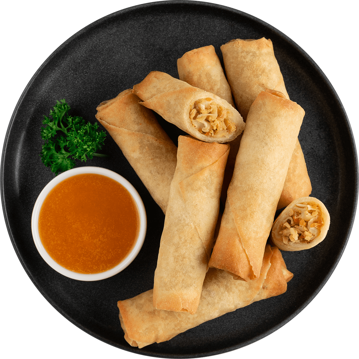 Spring Rolls on a black plate with sauce